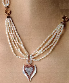 Pieces by  Erte Jewelry